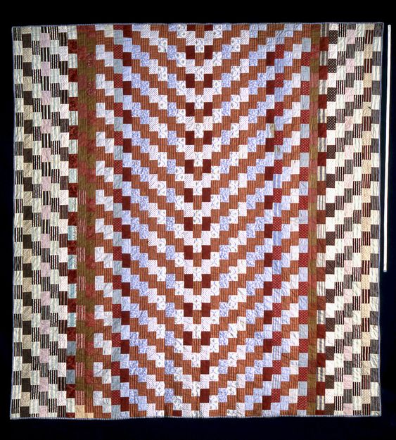 a quilt with brick wall patterns