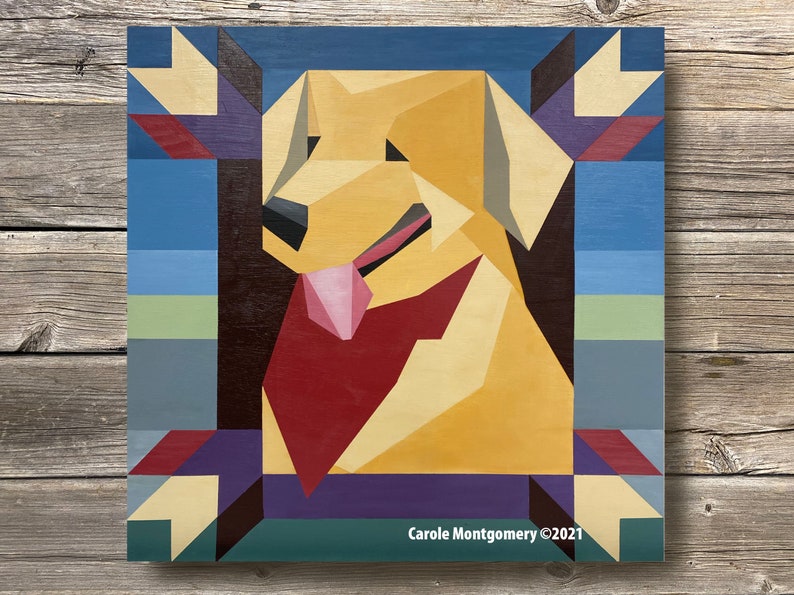 a dog pattern barn quilt hanging on the wooden wall