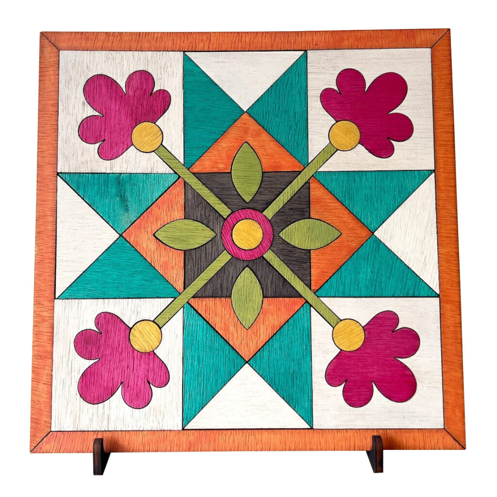 A vibrant square barn quilt with four symmetrically arranged flowers and a large star as the focal point patterns.