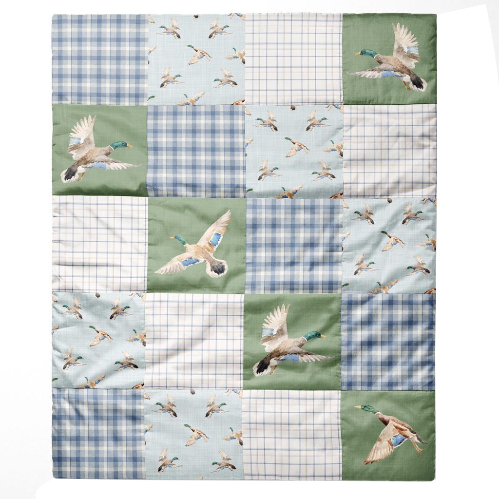 This faux patchwork blanket made of organic cotton is perfect for your son