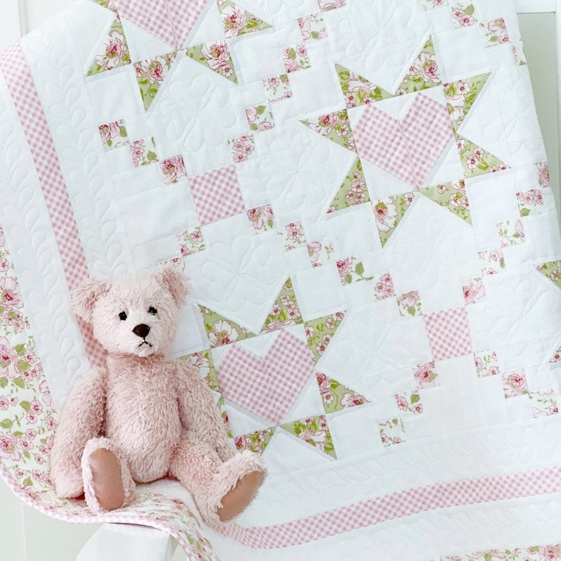 An extremely "adorable" baby quilt pattern that conveys the best for your child