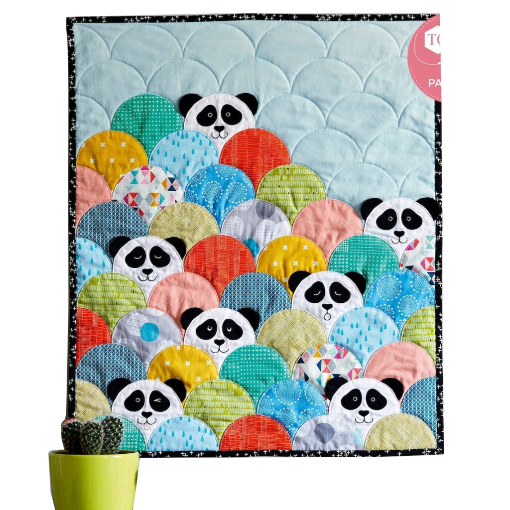 The pandas are patchwork and created in simple, funny shapes