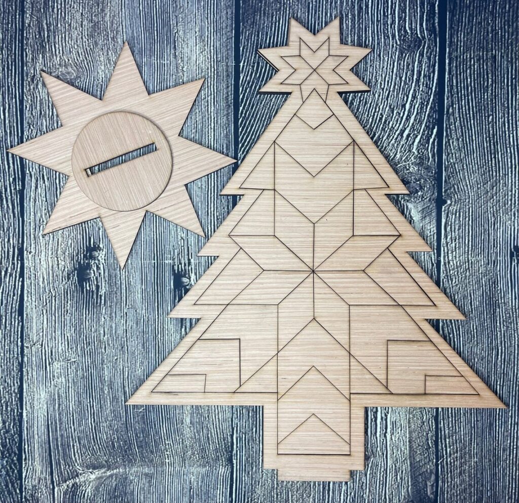 the barn quilt with a small star carved into the trunk of a pine tree hanging on the wood wall