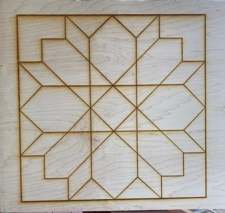 Rough Wooden Barn Quilt Block with a Flower-Shaped Laser Beam