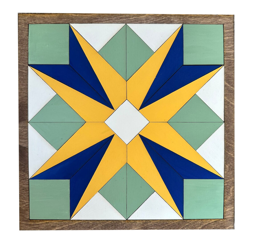 a barn quilt with 4 tulips partern in yelow and blue