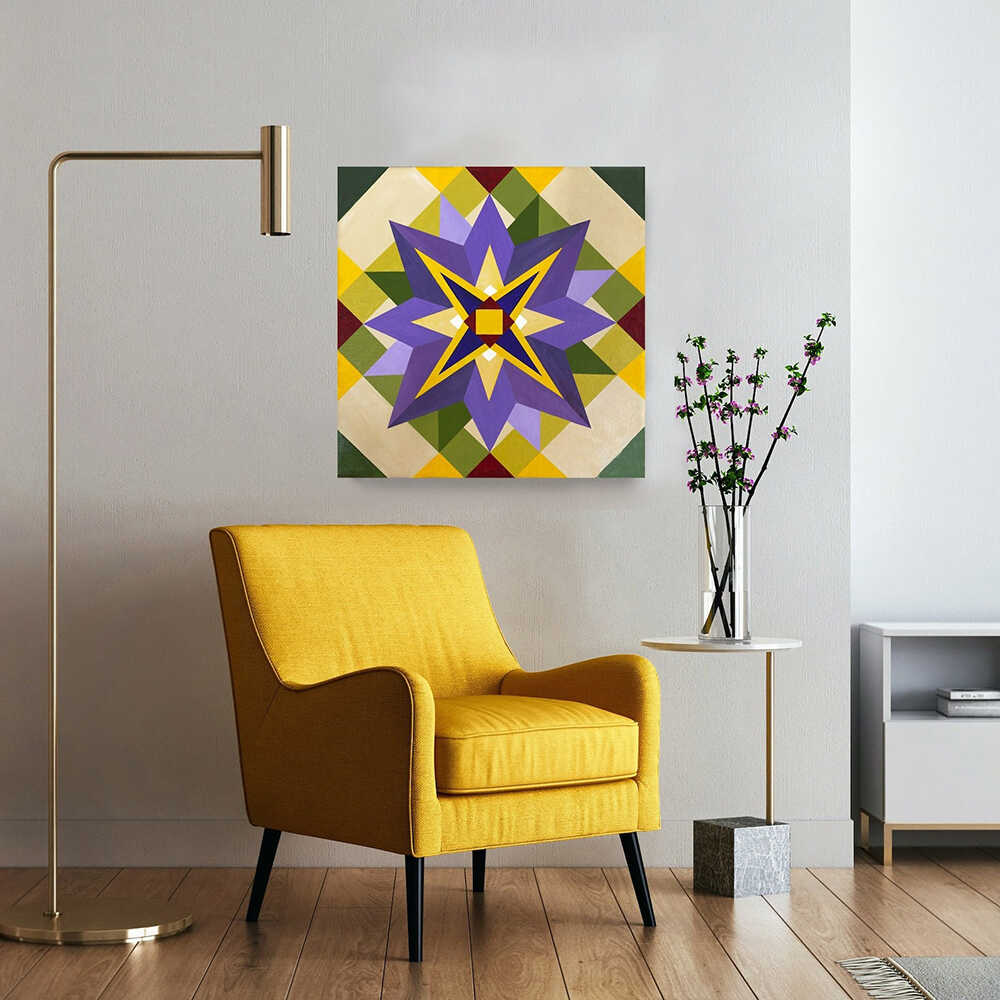 a barn quilt with purple flower pattern hanging on the wall