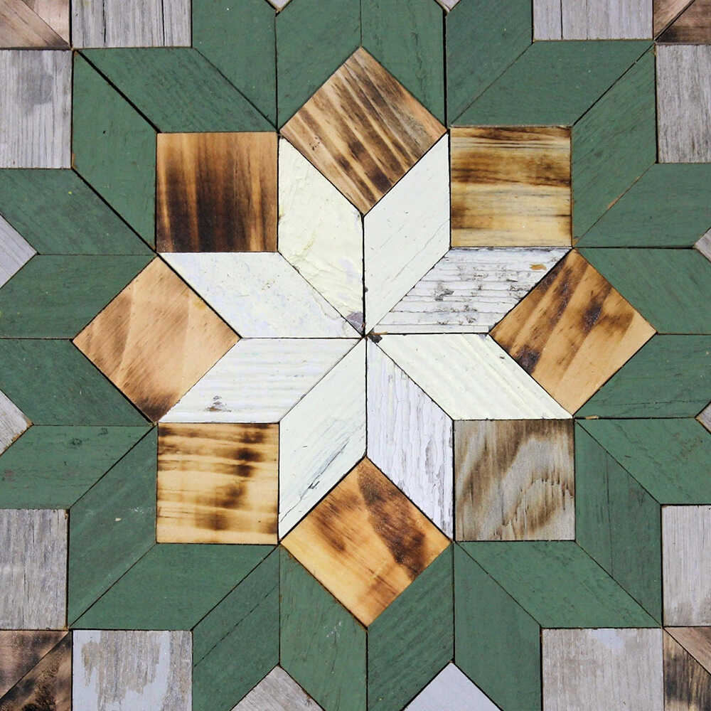 center of a barn quilt with colorful flower pattern