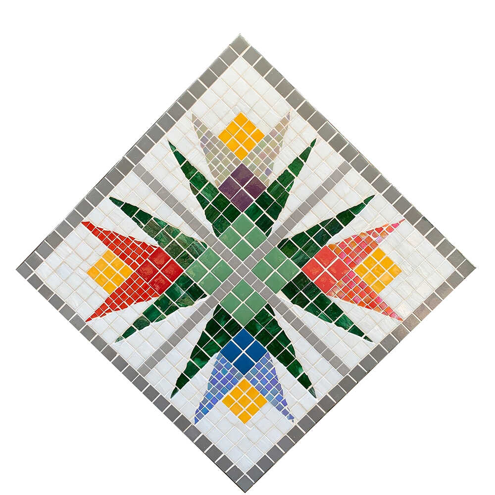 a barn quilt with four lilies pattern