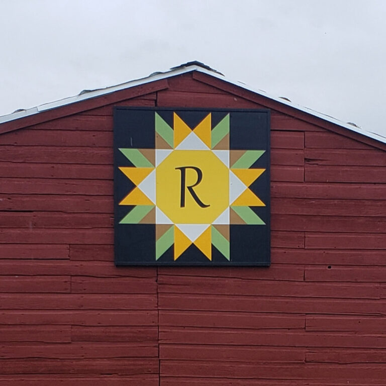 Sunflower barn quilt – black background with star and initials