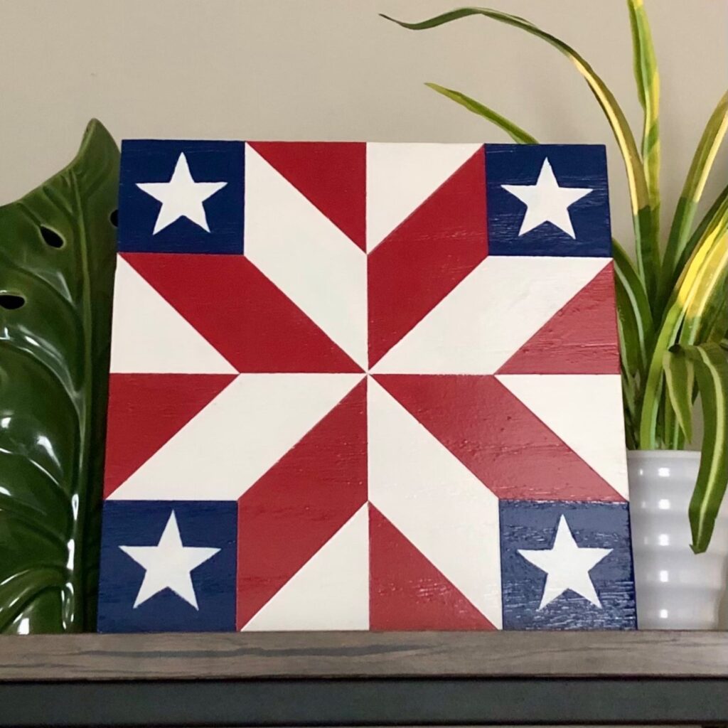 a barn quilt with an American flag pattern