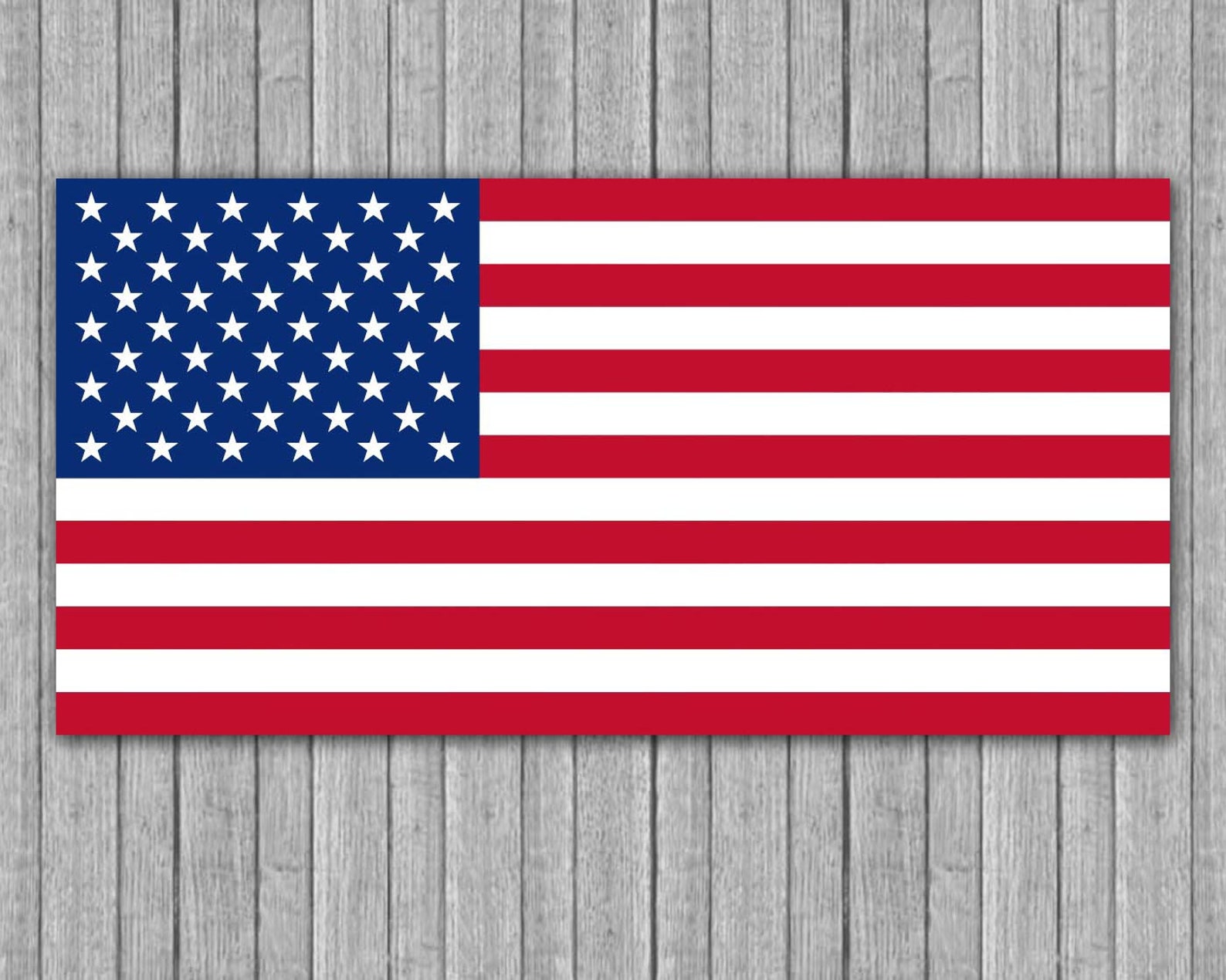 a american flag barn quilt hanging on the wooden wall