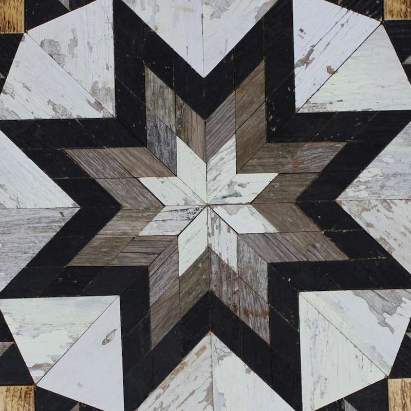 the center of this barn quilt with star pattern