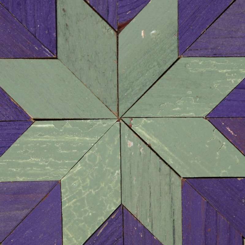 the center of the barn quilt with blue star pattern