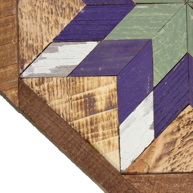 a corner of the barn quilt with blue star pattern