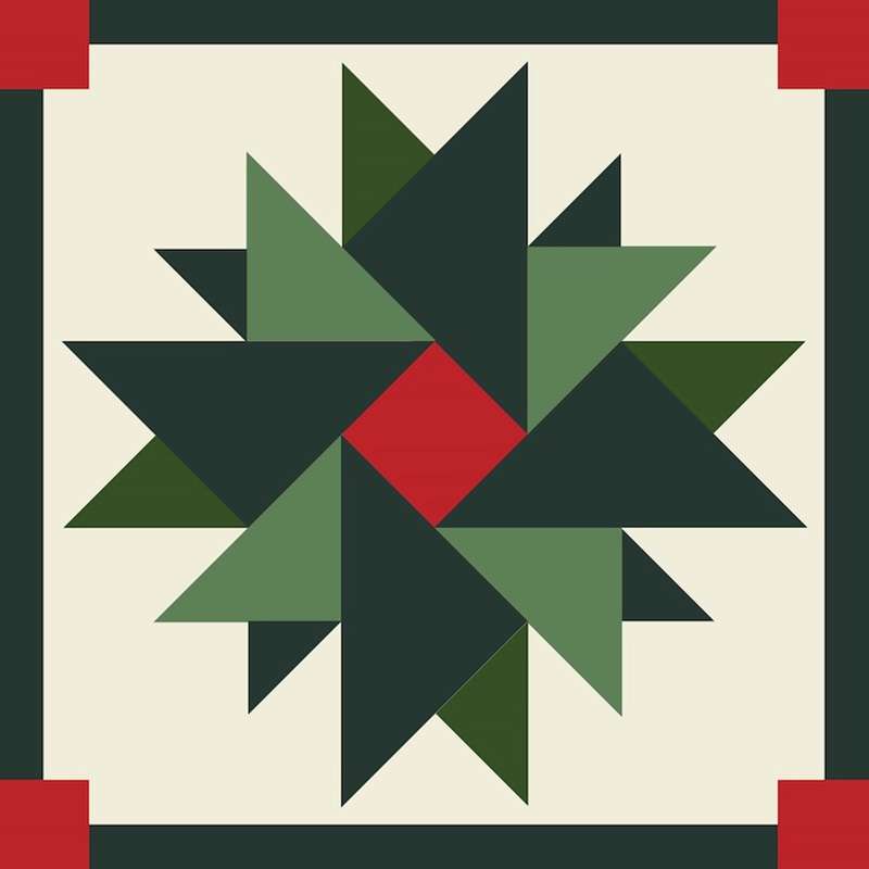 a barn quilt with blue and red star pattern