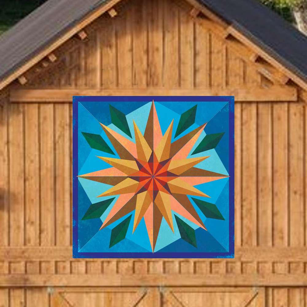 a sunflower barn quilt hanging on the wooden barn