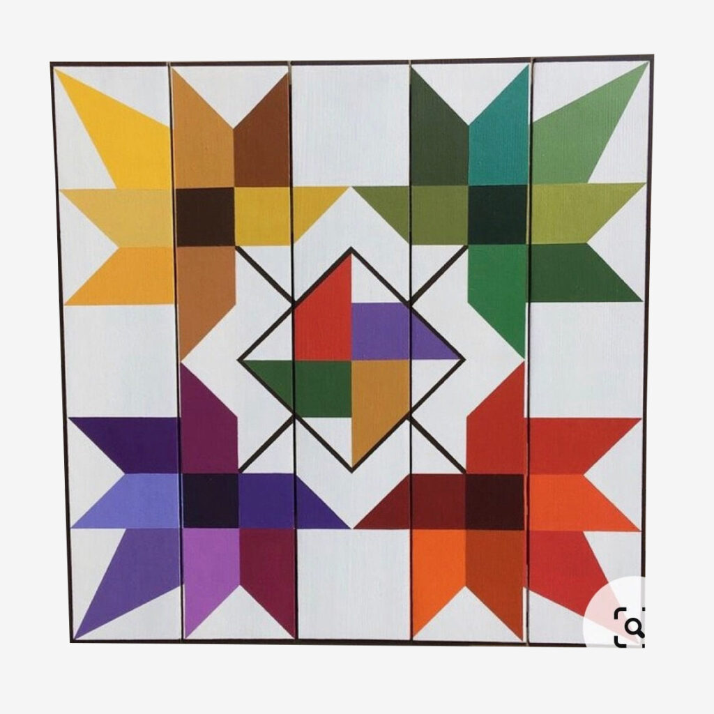 the barn quilt with four maple leaves pattern
