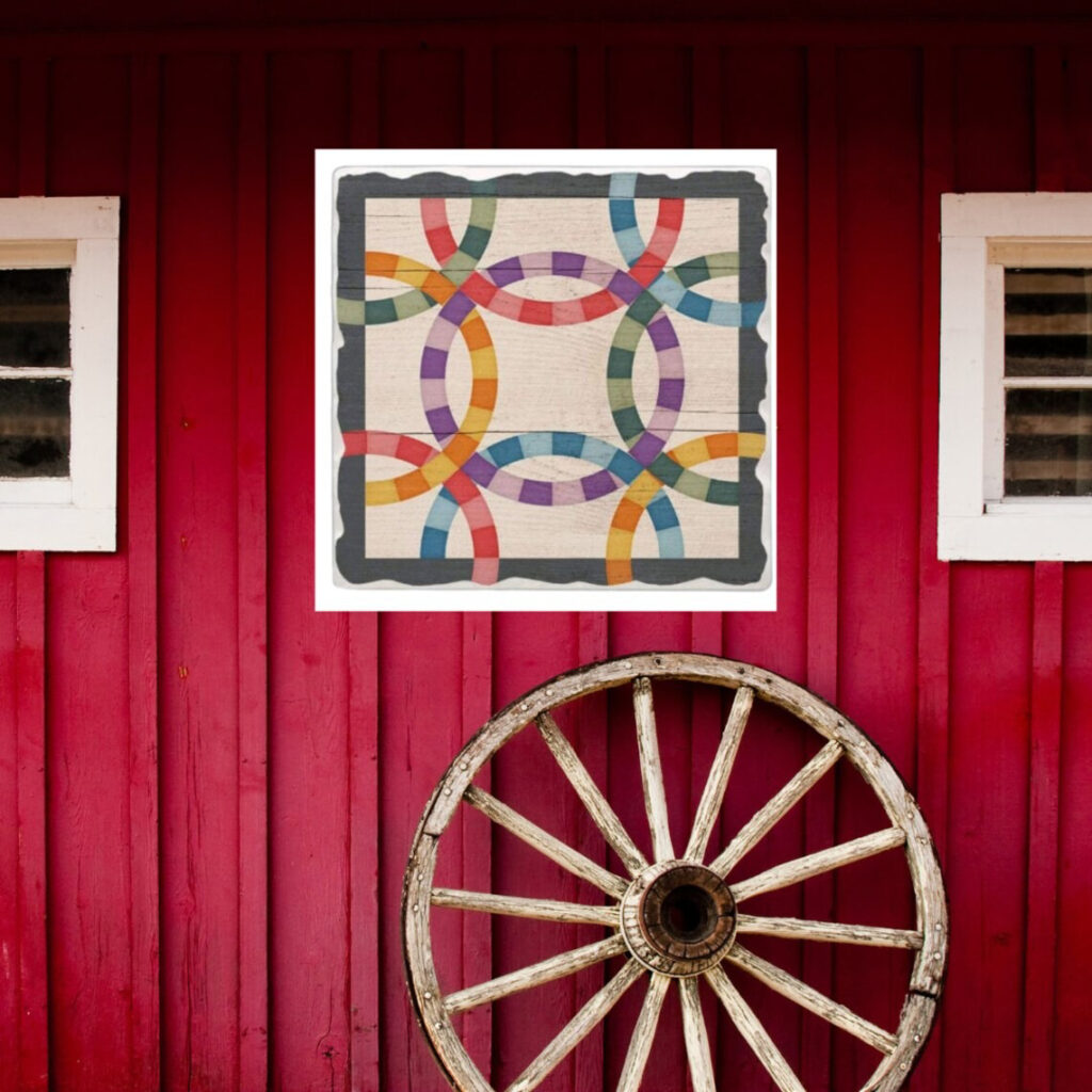 Modern barn quilts with double rings pattern hanging on the red wood wall