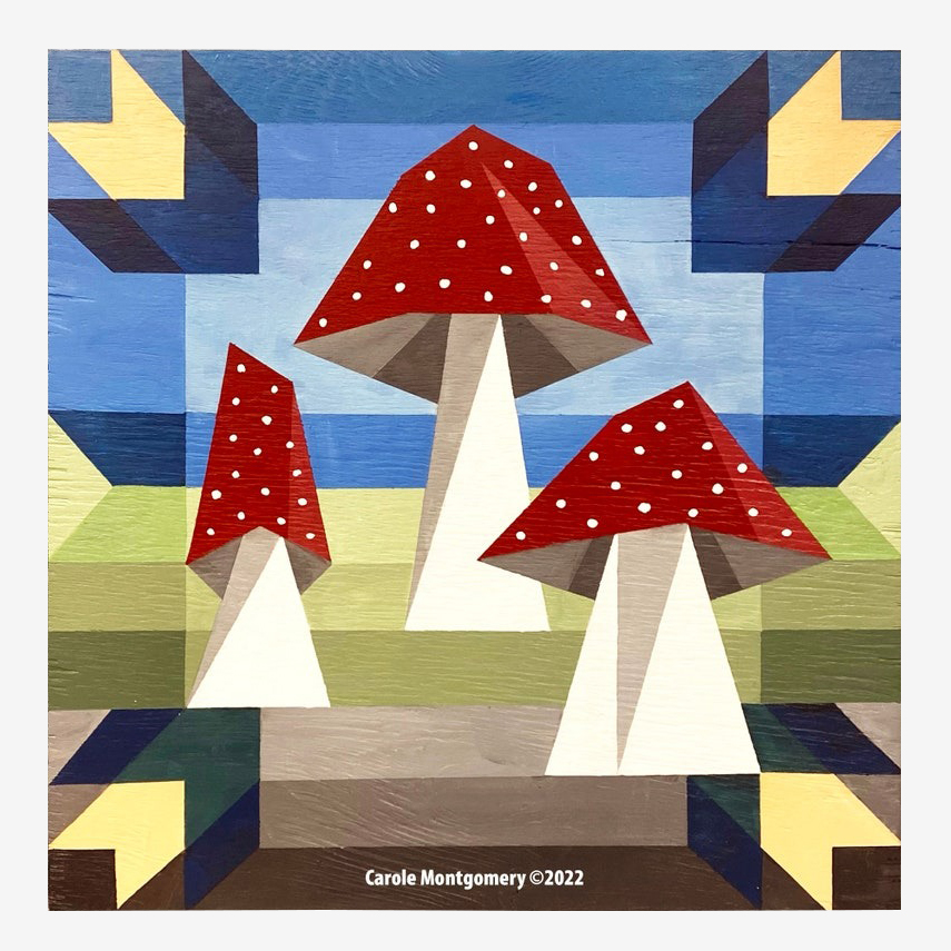 the barn quilt with three red mushrooms pattern