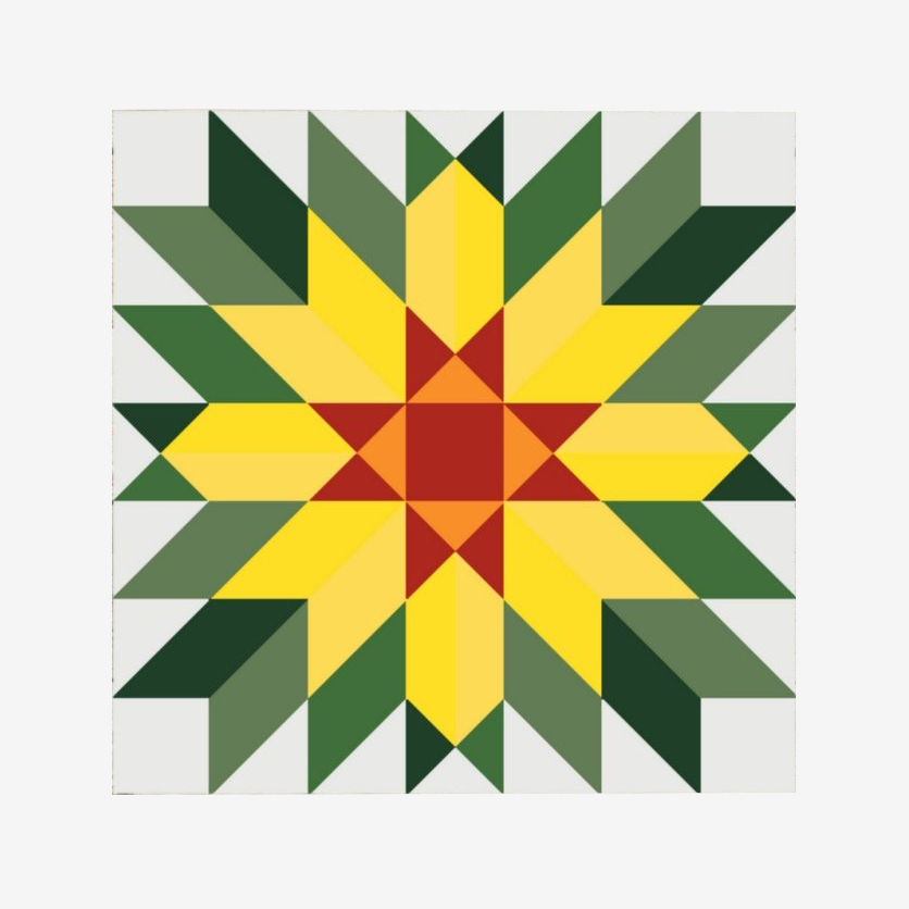 the barn quilt with a sunflower pattern