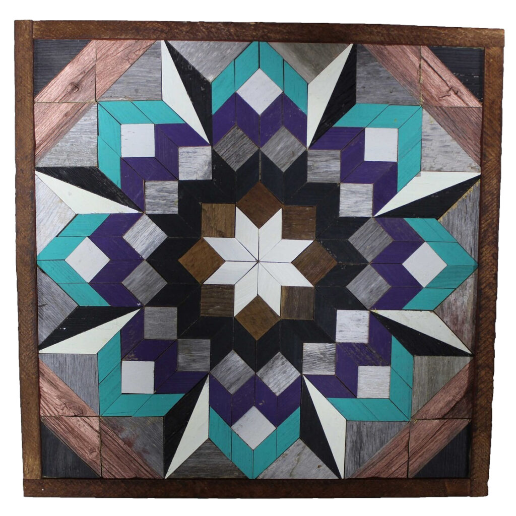 The square barn quilt with a large, vibrant flower pattern.