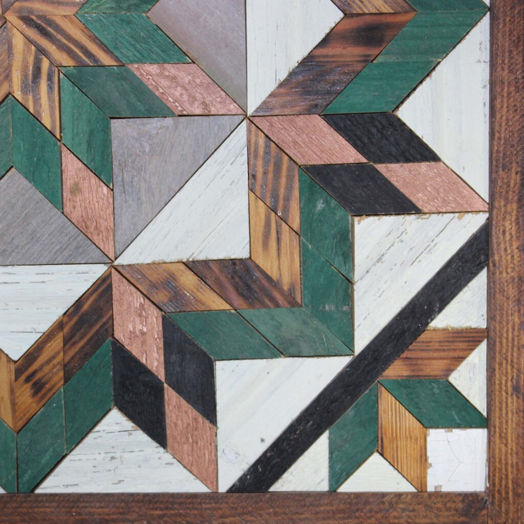 A part of the square barn quilt with Green Field Flower patterns and the wood color star pattern in center.