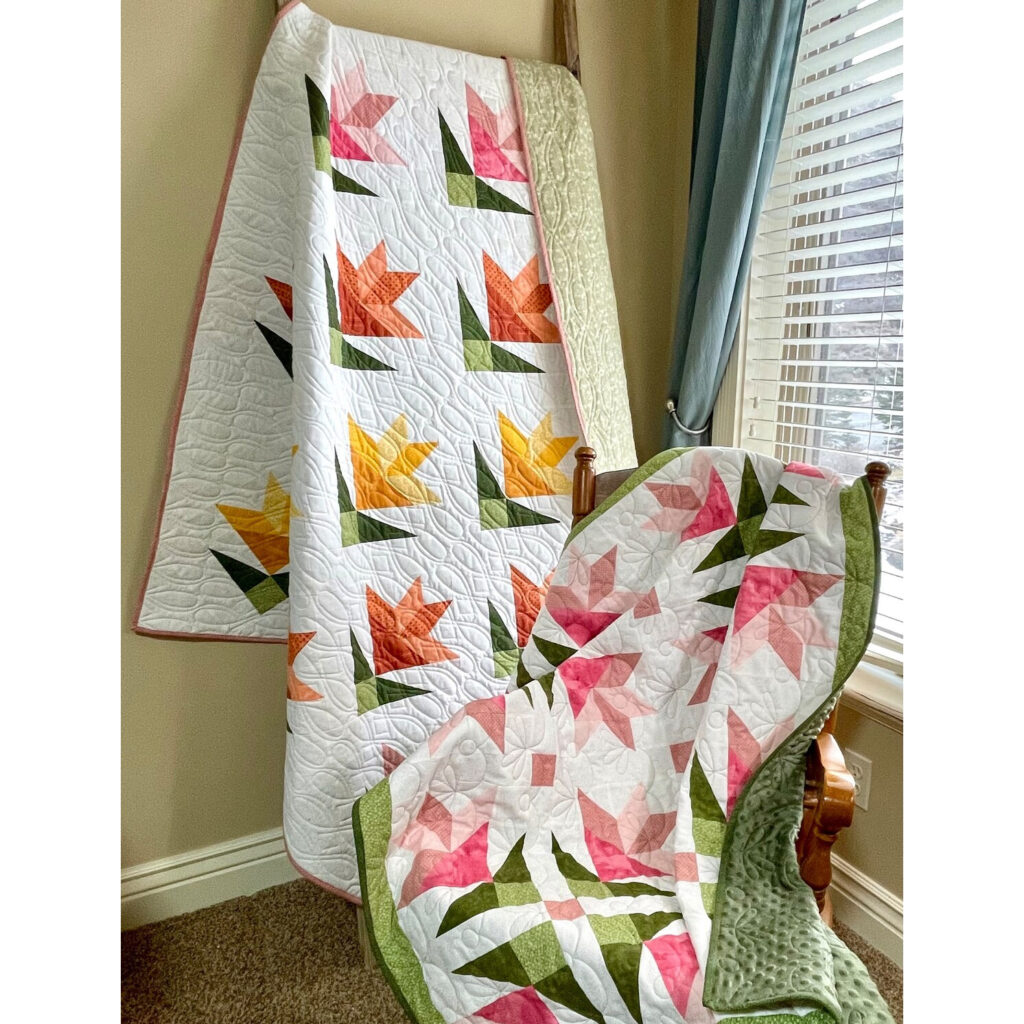 The Lilies on Parade Quilt Pattern celebrates the elegance
