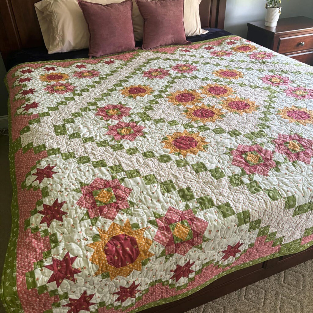 This is a gorgeous quilt for flower and garden lovers