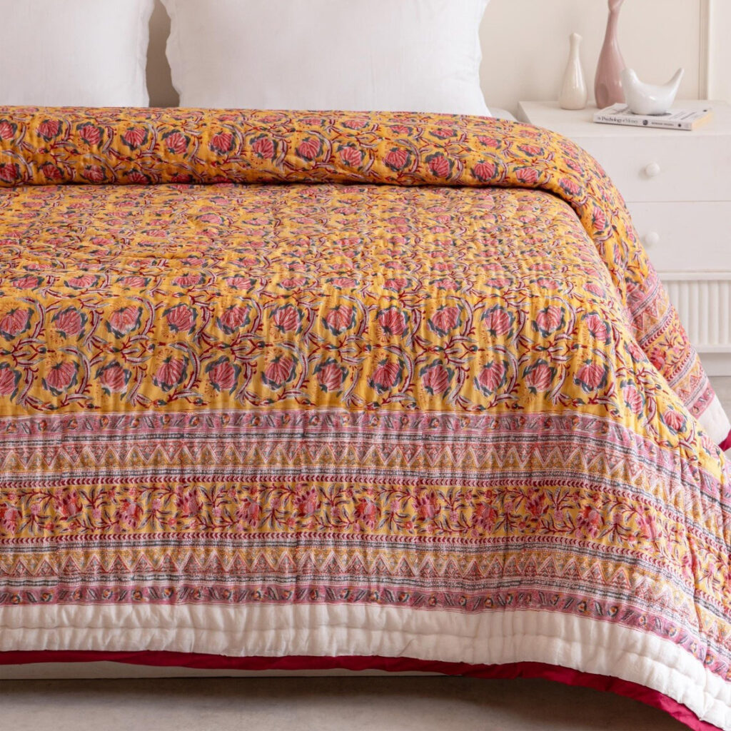 The amber mid-century modern quilt captures the warm